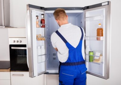 repairman-fixing-refrigerator