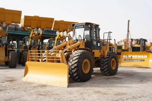 Get Caterpillar 966G Wheel Loader with Dozer Blade 2001