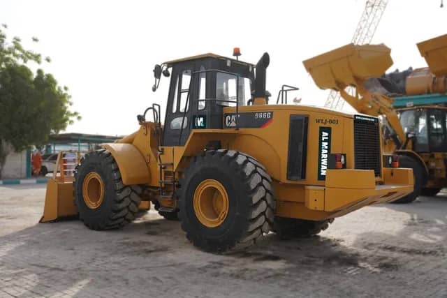 Get Caterpillar 966G Wheel Loader with Dozer Blade 2001