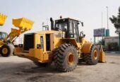 Get Caterpillar 966G Wheel Loader with Dozer Blade 2001